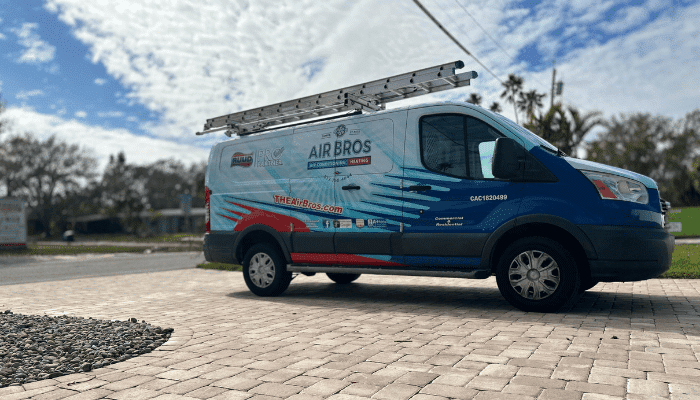 Air Bros Emergency Services truck parked in a home's driveway.