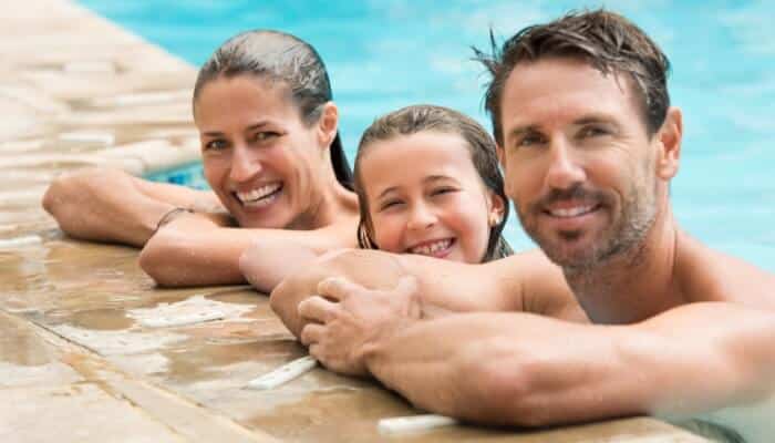 Parents And Child In Pool Parents And Child In Pool